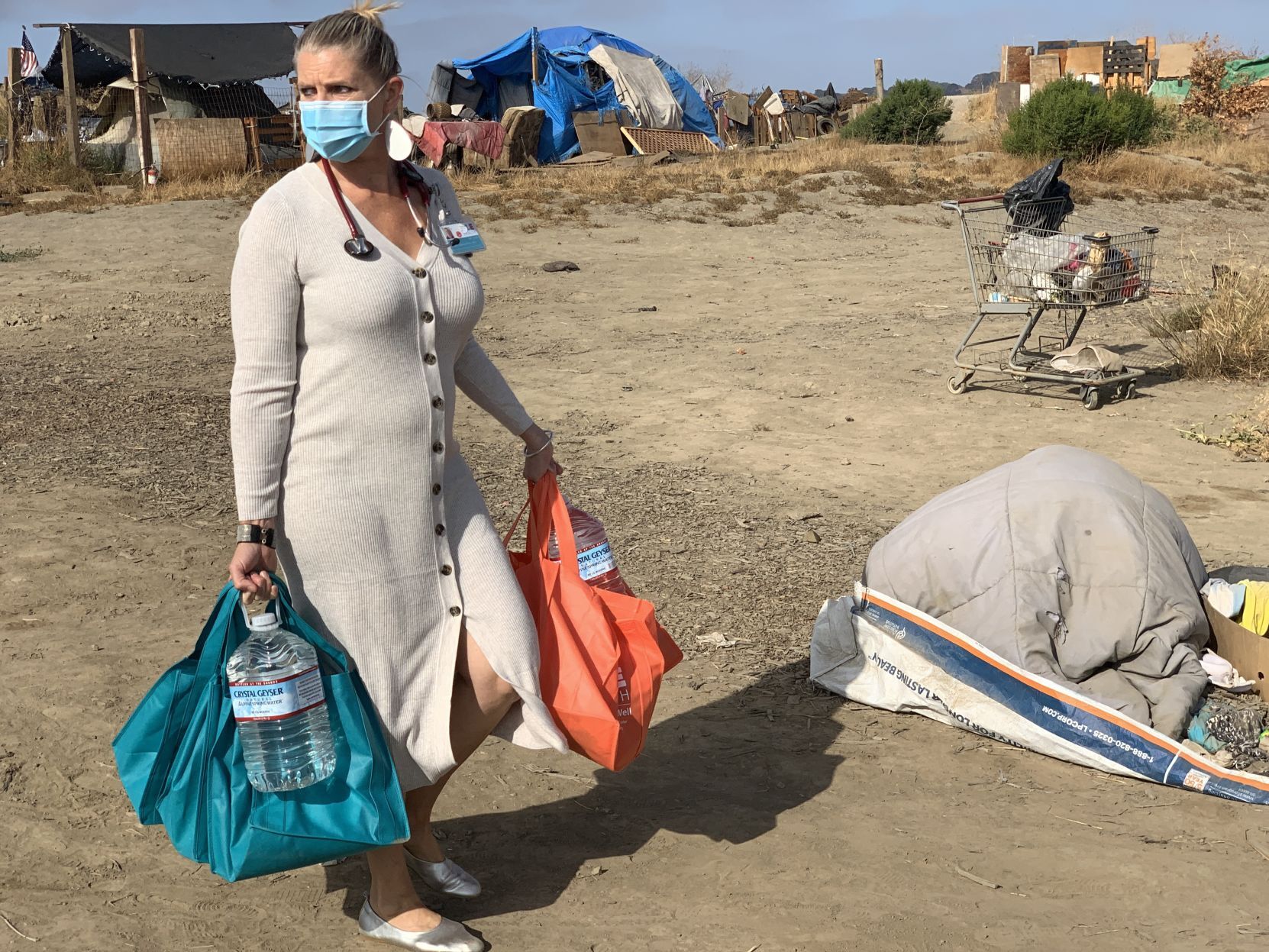 OLE Health distributes care bags to residents of the Bowl